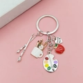 Artistic silver keychain with paintbrush, palette, and heart-shaped Thank You charm - Palette Brush Apple Style