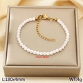Elegante bracciale di perle di vetro bianche da 4mm con chiusura dorata su seta - 4mm Oro