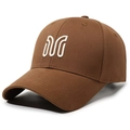 Dark brown cotton baseball cap with white 3D letter M embroidery in a side 45-degree view - Coffee