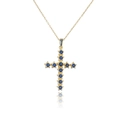 Macro-opname van ster-hanger in 18K goud met donkerblauwe zirkoon op een fijne ketting - Goud met blauwe steen