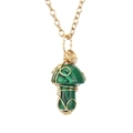 Close-up of handmade gold wire-wrapped malachite mushroom pendant with detail texture - Synthetic Malachite