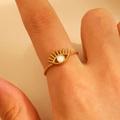 Gold stainless steel evil eye ring with white enamel detail on model finger - 18k Gold Plated (0194)