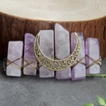 Handmade amethyst crystal hair clip with a bronze moon accent on rustic stone background - Light Amethyst Moon Hair Clip