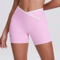 Detail of high waisted yoga shorts featuring V-cross waistband and white contrast piping - Sakura Pink (7117)