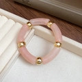 Minimalist pink acrylic bamboo tube bracelet with elegant golden metal spacer beads - Peach Pink