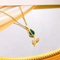Elegant gold tulip necklace with green cat-eye stone and small diamond details - Dark Green Cat Eye Necklace / Gold