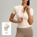 Slim fit ivory white short sleeve yoga top with high collar and zipper closure - S / Tops / Ivory