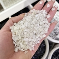 Polished natural white crystal gravel stones held in hand for size and clarity - White Moonstone / 5-7mm 100g