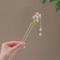 Elegant gold lily of the valley hair pin with white bell flowers and hanging tassels - Double Pin Lily of the Valley