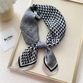 Elegant silk scarf featuring black and white geometric triangle patterns with a satin finish - Beige Triangle Geo