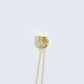 Golden necklace featuring a round pearl-studded pendant in a creative letter Q style - Letter Q