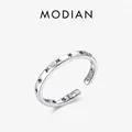 Minimalist S925 sterling silver open ring featuring hollow star patterns and adjustable band - Adjustable / Silver
