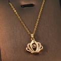 Elegant gold crown pendant necklace with micro-pave crystals and sparkling center stone - Gold-Dancing Crown