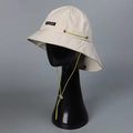 Detail of light beige nylon sun hat with extended neck protection and yellow drawstring - M (56-58cm) / Beige