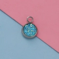 Close-up of 12mm blue glitter pendant charm with silver bezel for DIY jewelry making - Blue Glitter Granule Style (18)