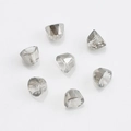 Macro shot of 8mm transparent faceted crystal glass beads with center holes for DIY - Smoke Gray