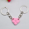 Pink heart-shaped brick keychain pair with silver metal rings for couples - Pink