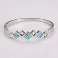 Zilveren roestvrijstalen armband met turkooizen accenten en diamant inlegwerk - Staalkleur