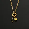 Elegante 14K gouden roestvrijstalen ketting met letter k-hanger en gele zirkoon - Letter X