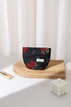 Close-up of vintage red rose embroidery on a black cosmetic bag with gold flower zipper - Red Small