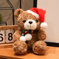 Brauner Plüschteddybär mit roter Weihnachtsmütze und Streifenschal auf Holzgrund - 18cm / Braun