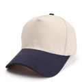 Detail of two-tone cotton baseball cap showing navy brim stitching and beige crown - Adjustable / Beige Navy Blue Patchwork
