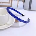 Detail of blue beaded braided headband resting on a white ceramic teacup and saucer - Royal Blue