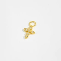 Macro view of a gold-plated silver cross pendant set with five clear sparkling zircons - SSE38-Gold Cross
