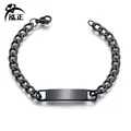 Macro view of black titanium steel Cuban link bracelet with rectangle blank ID tag - Men's Bracelet (Black)