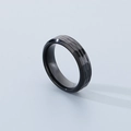 Macro detail of men's black titanium ring with hammered texture and metallic finish - Black Beveled (6mm)