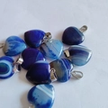 Polished blue and purple heart-shaped agate pendants with natural striped patterns - Dark Blue Agate