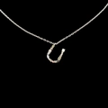 Silver letter U necklace pendant with colorful gemstones on a sleek black background - Letter U / Silver