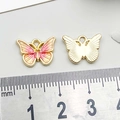 Pink and gold butterfly charm DIY jewelry pendant shown with measurement ruler - 1Pc Yellow & Pink Gradient Drip Oil Butterfly / 10*14mm