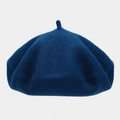 Detailed texture of thick dark blue wool beret hat with classic top tail decoration - One Size / Dark Blue
