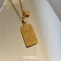Gouden Stier sterrenbeeld tarot hanger ketting met een minimalistische fijne schakel - Stier