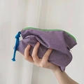 Detail of purple gingham cosmetic bag with vibrant green zipper and blue pull cord - Purple Plaid