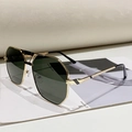 Lunettes de soleil vintage polygonales avec monture dorée et verres foncés - Monture Or Vert