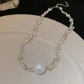 Irregular silver beads necklace with a large white pearl pendant on a white ripple plate - Silver Irregular Crushed Silver Large Pearl Necklace (15#)