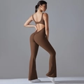 Detail of open back yoga jumpsuit with peach lift effect and flared leg design - S / Chestnut Brown
