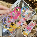 Close-up of colorful resin cartoon hair ties with glitter animal charms for girls - Cute Animal and Flower Style (TS-4)