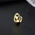 Grillz hip hop in rame placcato oro con un design a forma di cuore traforato - Cuore / Oro