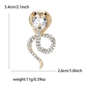 Broche de serpiente dorada con diamantes de imitación y detalles de dimensiones - Oro con Strass Transparente / Blanco