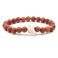 Elastic beaded bracelet with brown goldstone beads and white dolphin stone charm - Gold Sandstone