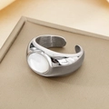Detail of silver stainless steel wide open ring with oval white stone inlay - Steel Color With White Shell Oval Open (KR111559-GC)