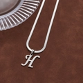 Silver stainless steel snake chain necklace with an artistic letter H pendant - Letter H