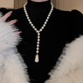 French vintage double layer necklace with white teardrop pearl and gold details on model - No.15 White Pearl Style / Gold