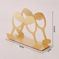Nordischer goldener Serviettenhalter aus Eisen mit Weinglas-Silhouette, 15x10,5x5cm - Martini Glas / Gold