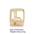 Macro detail of gold micro-pave cubic zirconia letter L charm bead for DIY jewelry - Letter L