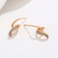 Elegant gold-plated S-shape wave earrings with pave-set sparkling zircon stones - Twisted Wavy Shape (No. 152) / Gold