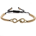 Golden and black woven adjustable bracelet with a zircon snake infinity charm - Snake Infinity Copper Bead Style / Gold + Black Rope